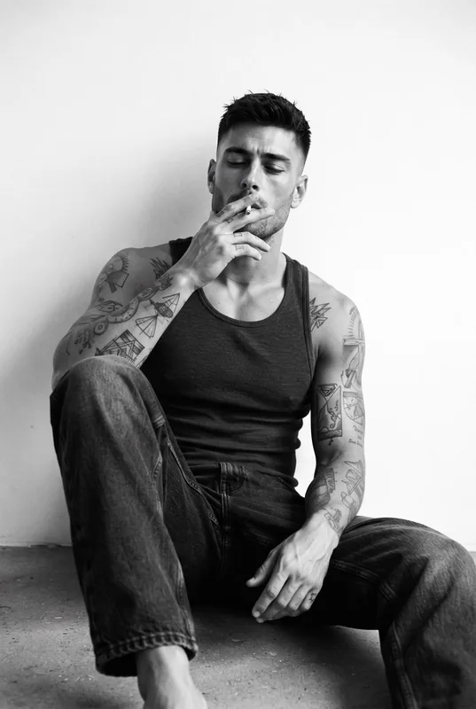 Ultra-realistic black-and-white candid portrait of the exact same adult man from…